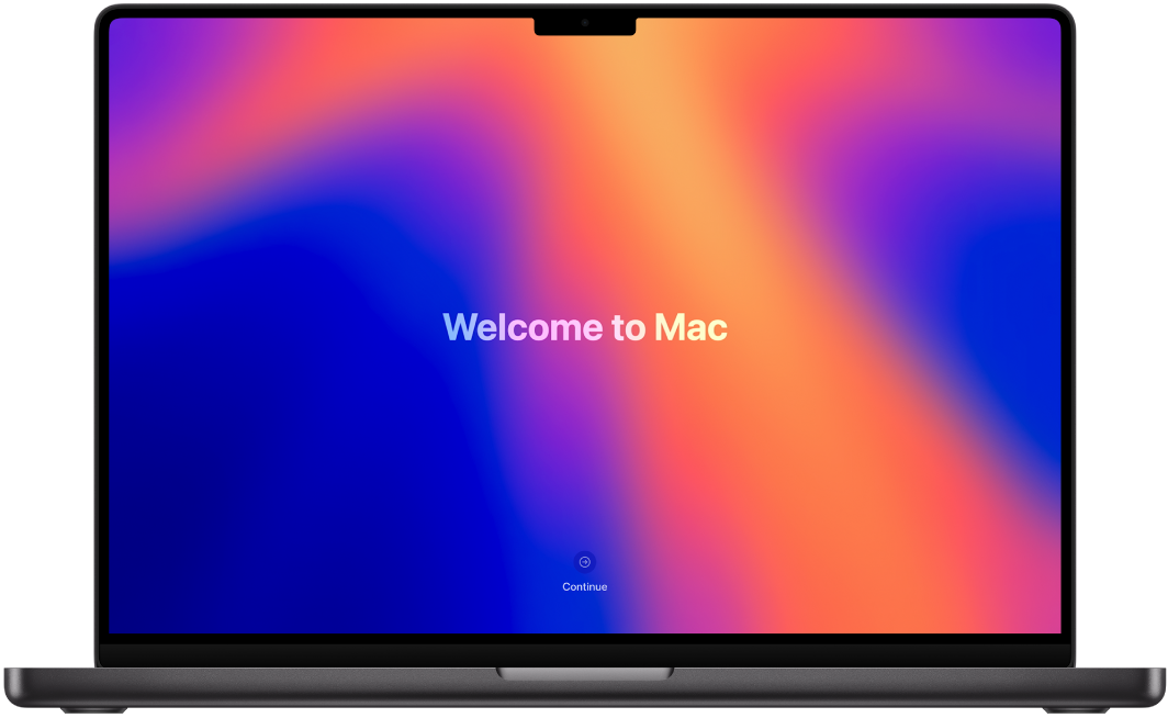 An open MacBook Pro with “Welcome to Mac” on the screen.