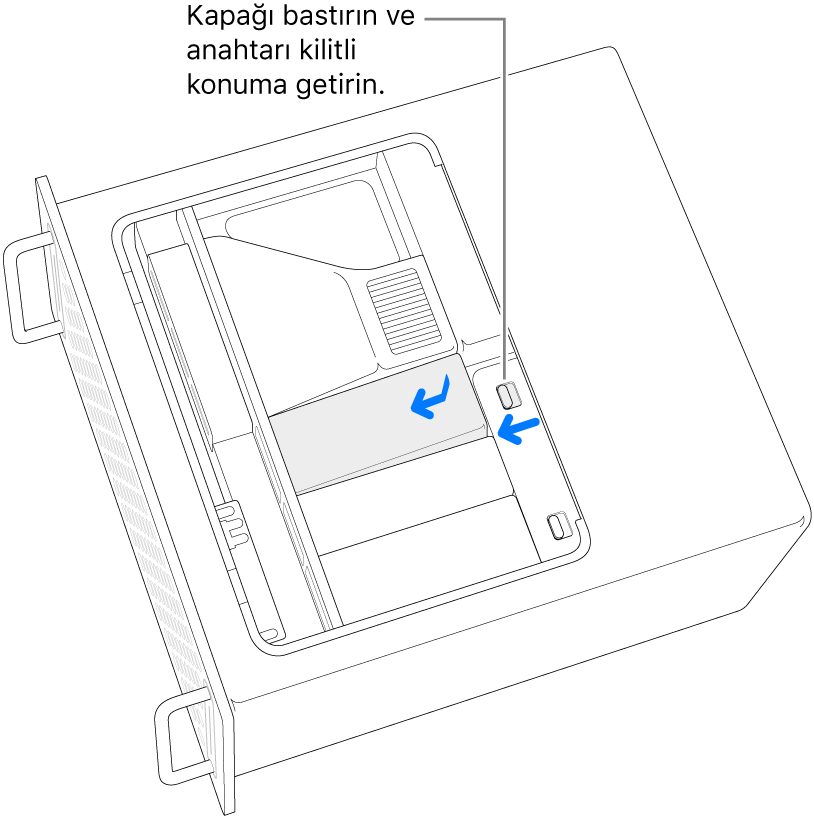 Kilit anahtarını sola hareket ettirip SSD kapağına bastırarak SSD kapakları yeniden takılıyor.