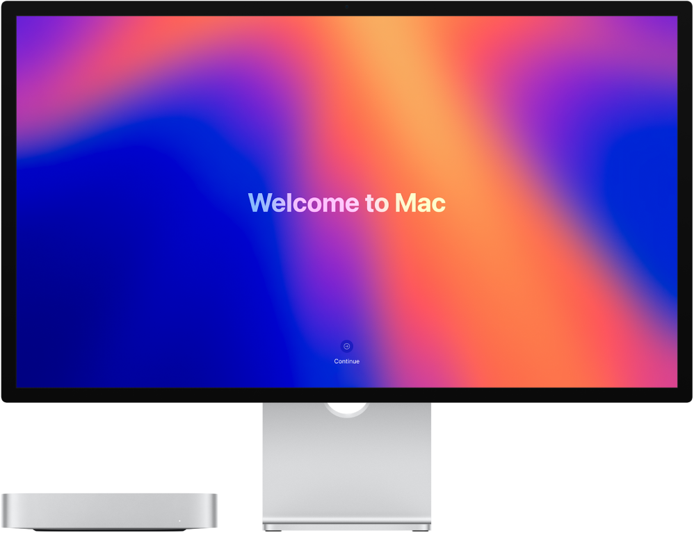 Mac mini i Studio Display obok siebie z napisem „Welcome to Mac” na ekranie.