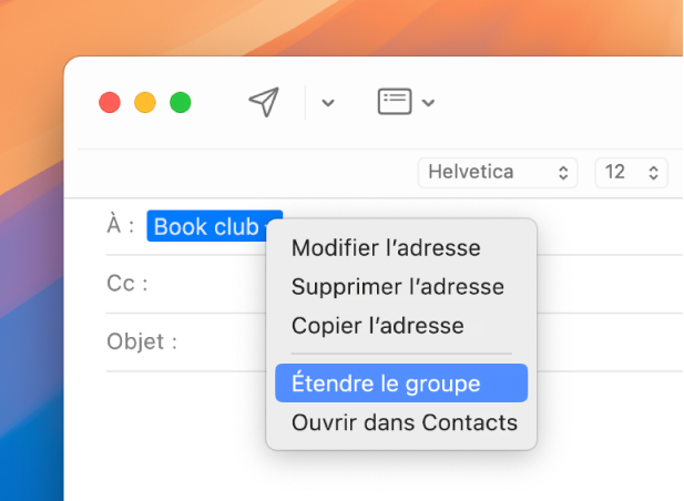 Un e-mail dans Mail, affichant une liste dans le champ À et le menu local avec la commande « Étendre le groupe » sélectionnée.