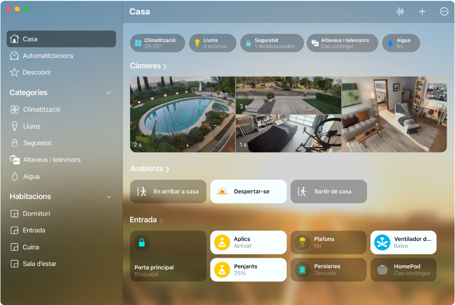 La pantalla de l’app Casa amb les categories d’accessoris al llarg de la part superior i, a continuació, les transmissions de les càmeres, les tessel·les dels ambients i les tessel·les dels accessoris de l’habitació “Entrada”.