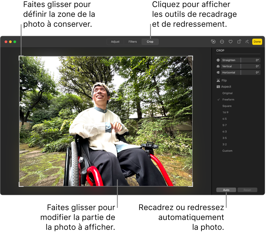 Une photo en mode édition, avec l’outil Recadrer sélectionné dans la barre d’outils, un rectangle de sélection autour de la photo, ainsi que des curseurs de redressement, des options de proportions, et des boutons Auto et Réinitialiser à droite.
