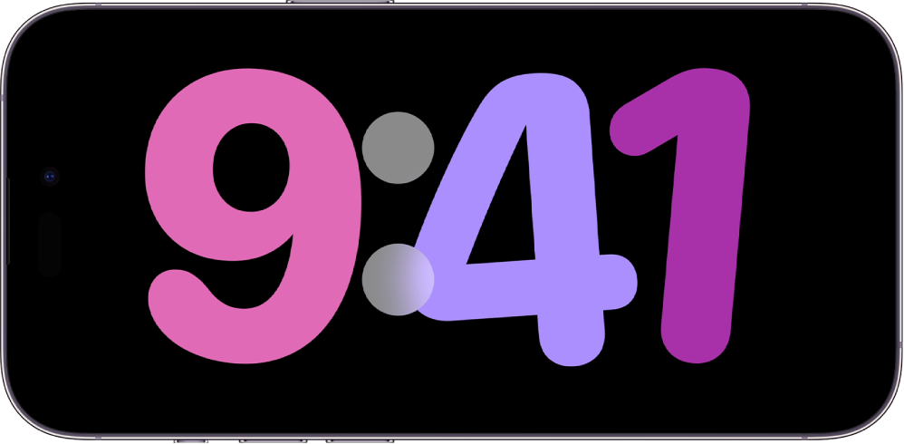 Pantalla de repòs d’un iPhone que s’està carregant en posició horitzontal, en què es pot veure un rellotge digital.