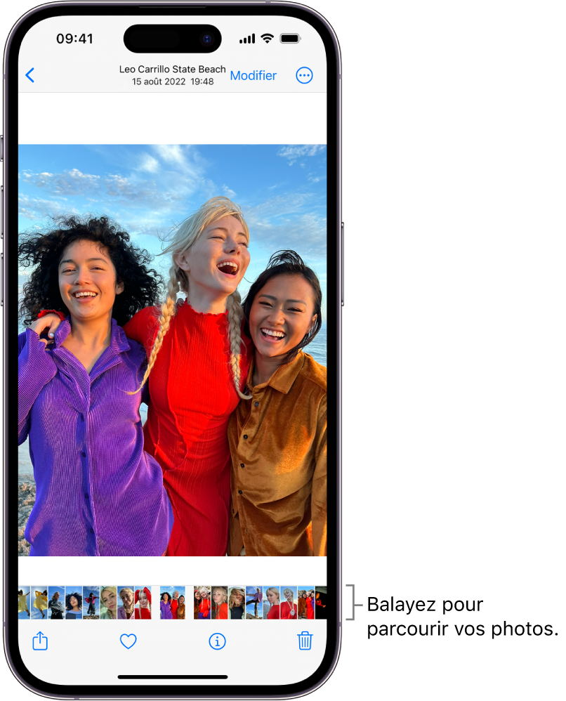 Une photo, avec les vignettes d’autres photos au bas de l’écran. En haut à gauche, le bouton Retour permet de revenir à l’affichage que vous étiez en train de parcourir. En bas, vous trouverez les boutons Partager, Aimer et Supprimer. En haut à droite se trouve le bouton Modifier.