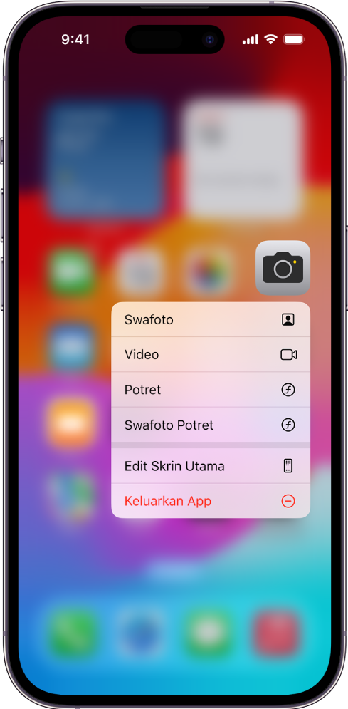 Skrin Utama yang kabur, dengan menu tindakan cepat Kamera ditunjukkan di bawah ikon app Kamera.