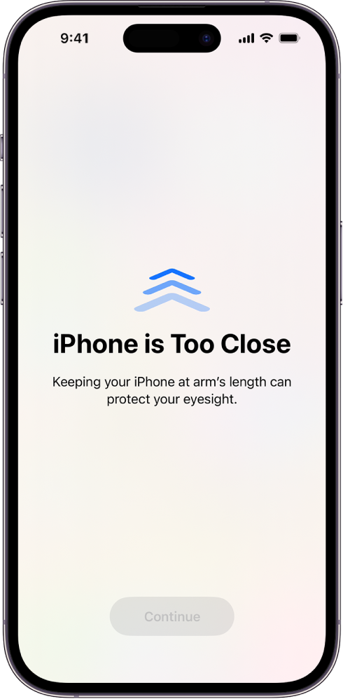iPhone ကို နီးကပ်လွန်းစွာ ကိုင်ထားကြောင်းနှင့် သင့်မျက်စိကျန်းမာရေးကို ကာကွယ်ရန် ပို၍ဝေးဝေးသို့ ရွှေ့သင့်ကြောင်း ဖန်သားပြင် သတိပေးချက်။ ဤသတိပေးချက်က ဖန်သားပြင်ကို ဖုံးအုပ်၍ သင့်ကို ဆက်မကြည့်နိုင်စေရန် တားဆီးသည်။ သင့် iPhone ကို ဘေးကင်းစိတ်ချရသော အကွာအဝေးသို့ ရွှေ့လိုက်သည့်အခါ ပေါ်လာသည့် Continue ခလုတ် ရှိသည်။