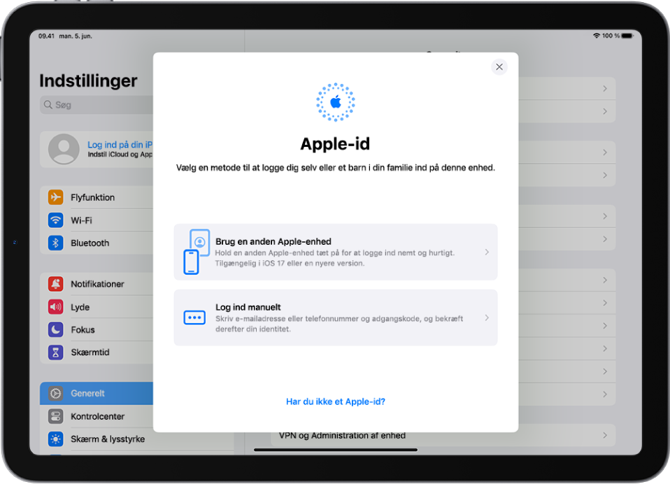 Skærmen Indstillinger med logindialogen til Apple-id midt på skærmen.