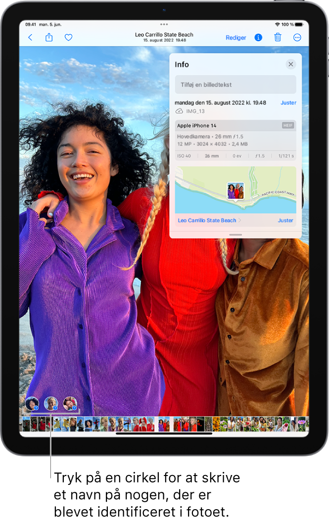 På iPad-skærmen vises et foto, der er åbent i appen Fotos. I det nederste venstre hjørne af fotoet er der spørgsmålstegn ved siden af personerne på fotoet.
