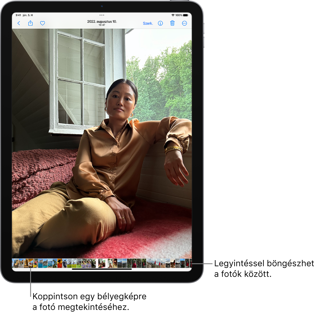A Fotók app egy teljes képernyős nézetben megjelenített fotóval. A képernyő alján a könyvtárban lévő többi fotó bélyegképei jelennek meg.