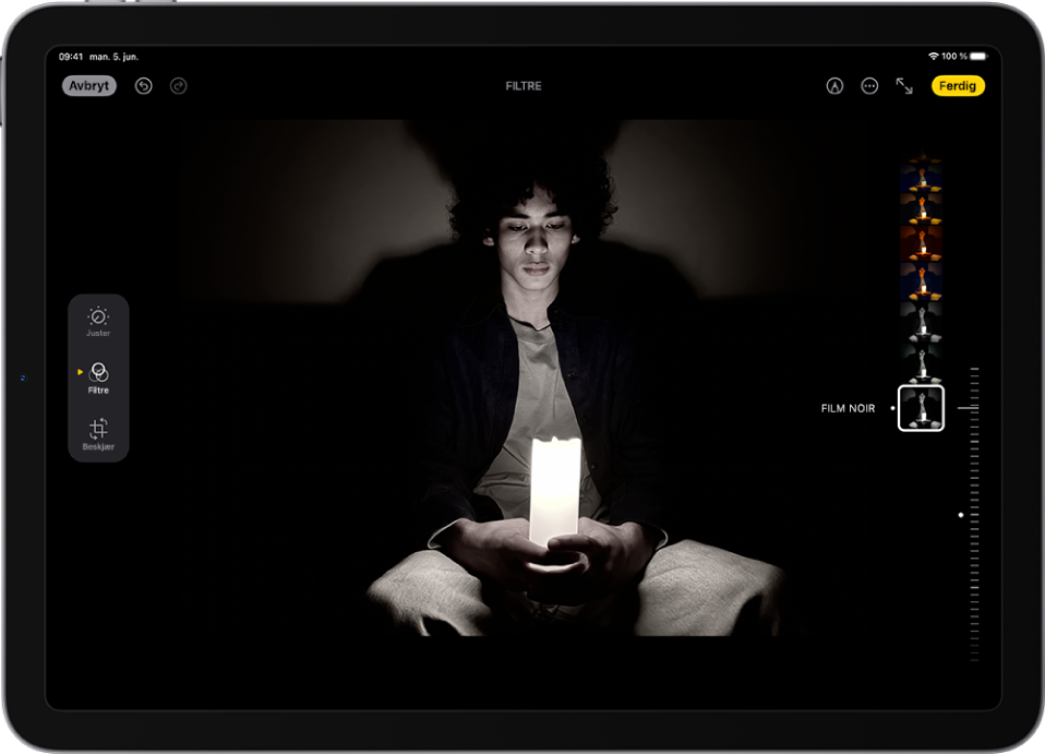 Rediger-skjermen i Bilder-appen, med et bilde i midten. På venstre side av skjermen er knappene Juster, Filtre og Beskjær. Filtre er markert. På høyre side av skjermen er filtervalgene og en skyveknapp for å justere nivået på filtereffekten.