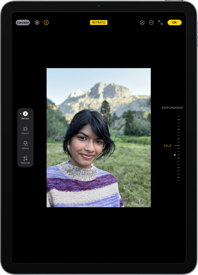 Tela Editar de uma foto no modo Retrato. Um retrato está no centro da tela. No lado direito da tela, um controle deslizante para alterar o Ajuste de Profundidade. No lado esquerdo da tela estão os botões Retrato, Ajustar, Filtros e Recortar. O botão Retrato está selecionado.