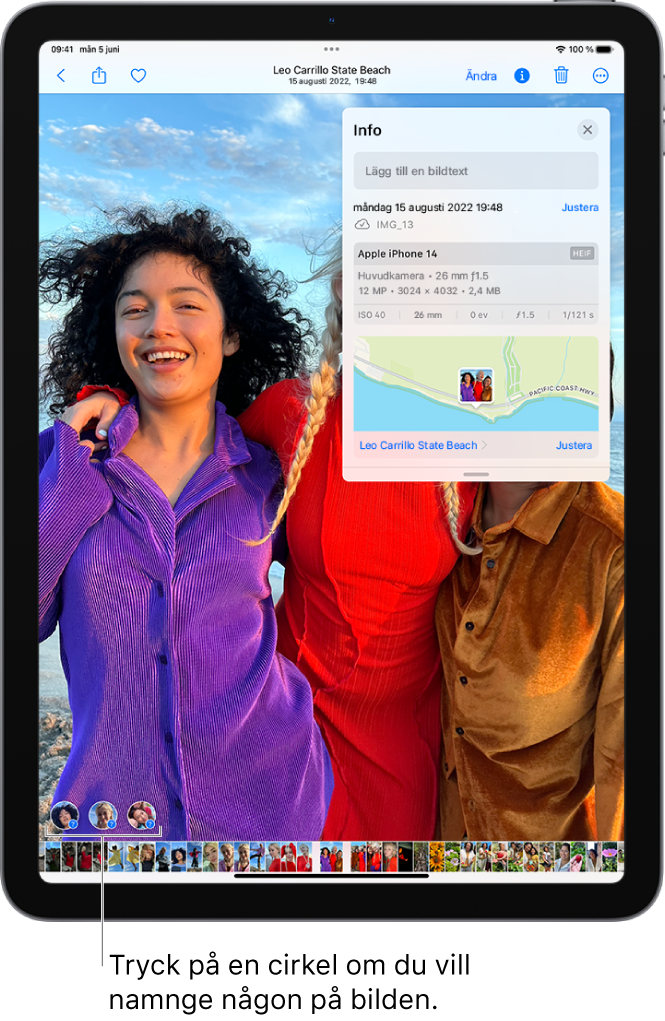 iPad-skärmen visar en bild som är öppen i appen Bilder. I det nedre vänstra hörnet på bilden finns frågetecken bredvid personer som visas i bilden.