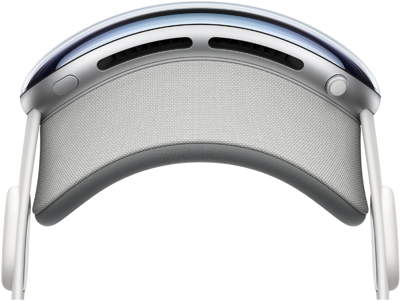 Apple Vision Pro with the top button shown on the top-left side of the device.