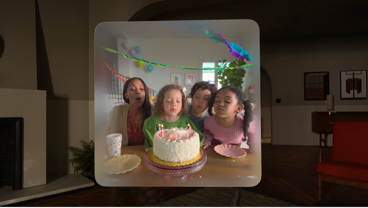 A spatial video playing, showing a child’s birthday party.