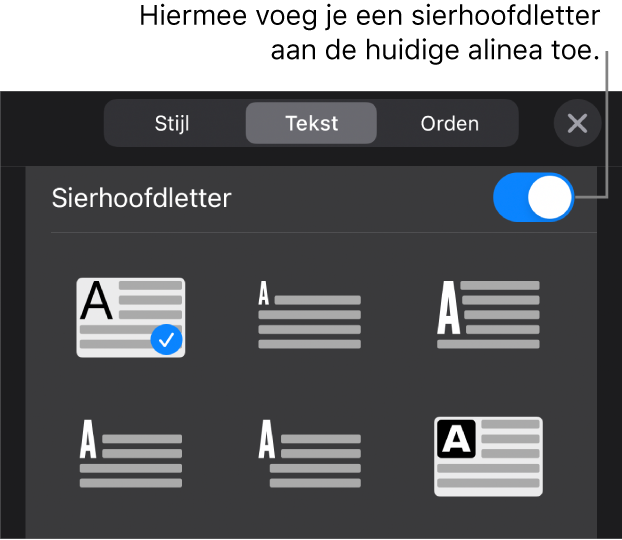 De regelaars voor sierhoofdletters in het menu 'Tekst'.