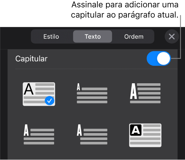 Os controlos de "Capitular” no menu “Texto”.