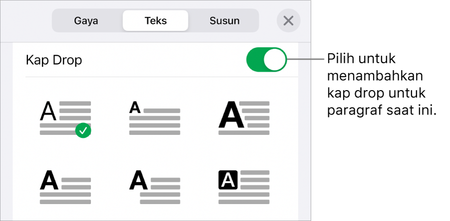 Kontrol Kap Drop terletak di menu Teks.