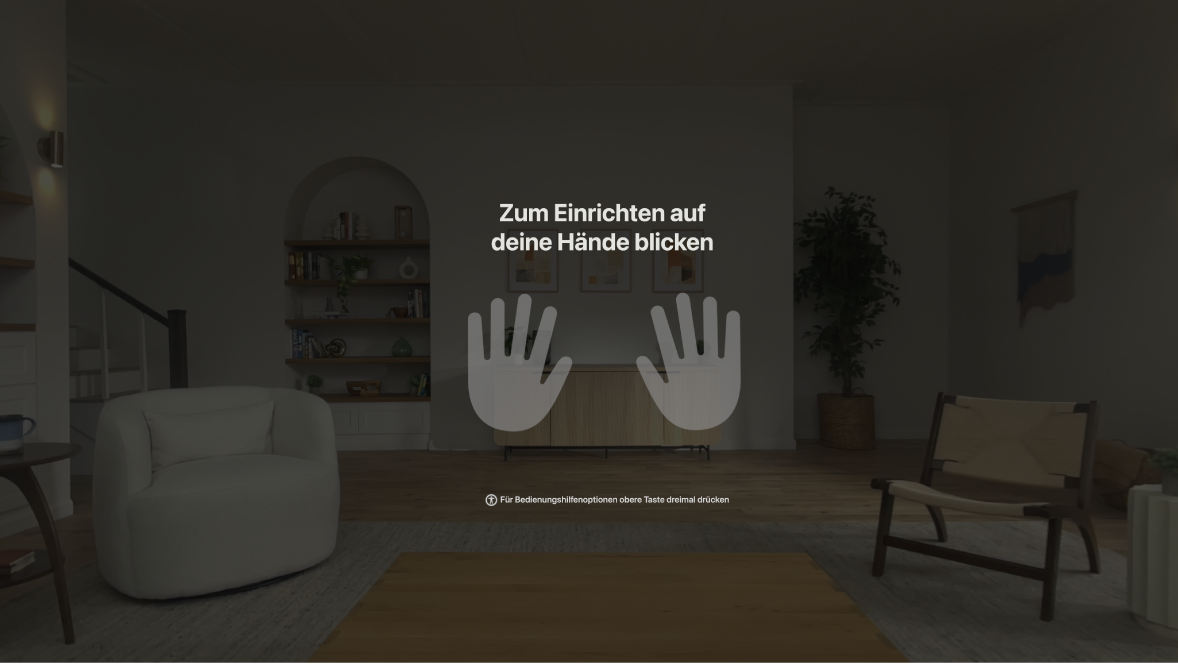 Einrichtung der Hände auf der Apple Vision Pro. Benutzer:innen werden aufgefordert, ihre Hände anzusehen, die vor ihnen angezeigt werden.