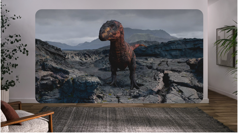 Apple Vision Proのユーザの表示。「恐竜たちとの遭遇」インタラクティブ体験の恐竜がフレーム内に表示されています。