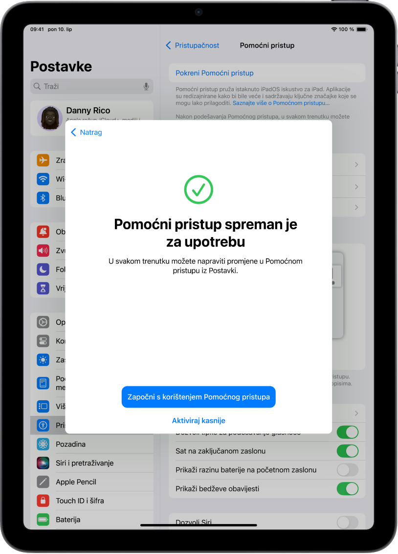 iPad koji pokazuje da je Pomoćni pristup spreman za uporabu, s tipkom za otvaranje Pomoćnog pristupa vidljivom pri dnu zaslona.