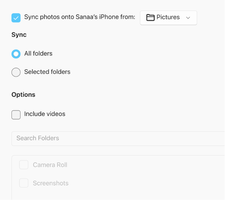 “All photos and albums” and Selected albums radio buttons appear with “Only favorites, “Include videos,” and “Automatically include photos from” checkboxes below.