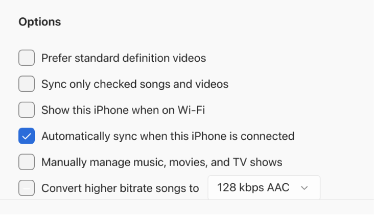 Opciones para sincronizar tu dispositivo Apple con tu equipo con Windows. La opción Sincronizar automáticamente cuando este iPhone esté conectado está seleccionada.