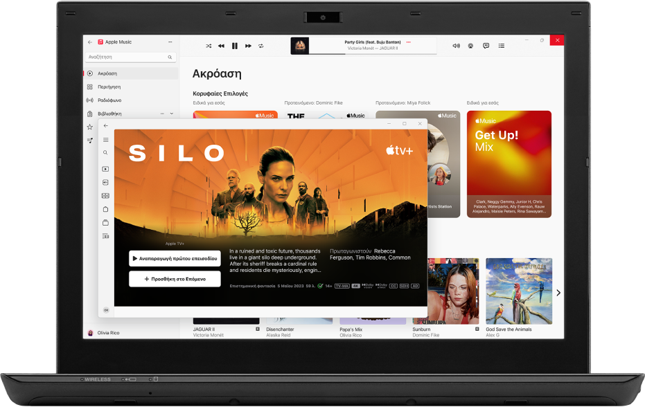 Ένα PC με ανοιχτές τις εφαρμογές Apple TV και Apple Music.