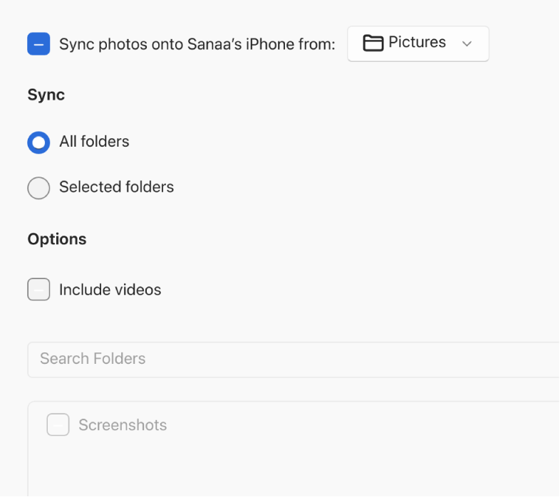 “All photos and albums” and Selected albums radio buttons appear with “Only favorites, “Include videos,” and “Automatically include photos from” checkboxes below.