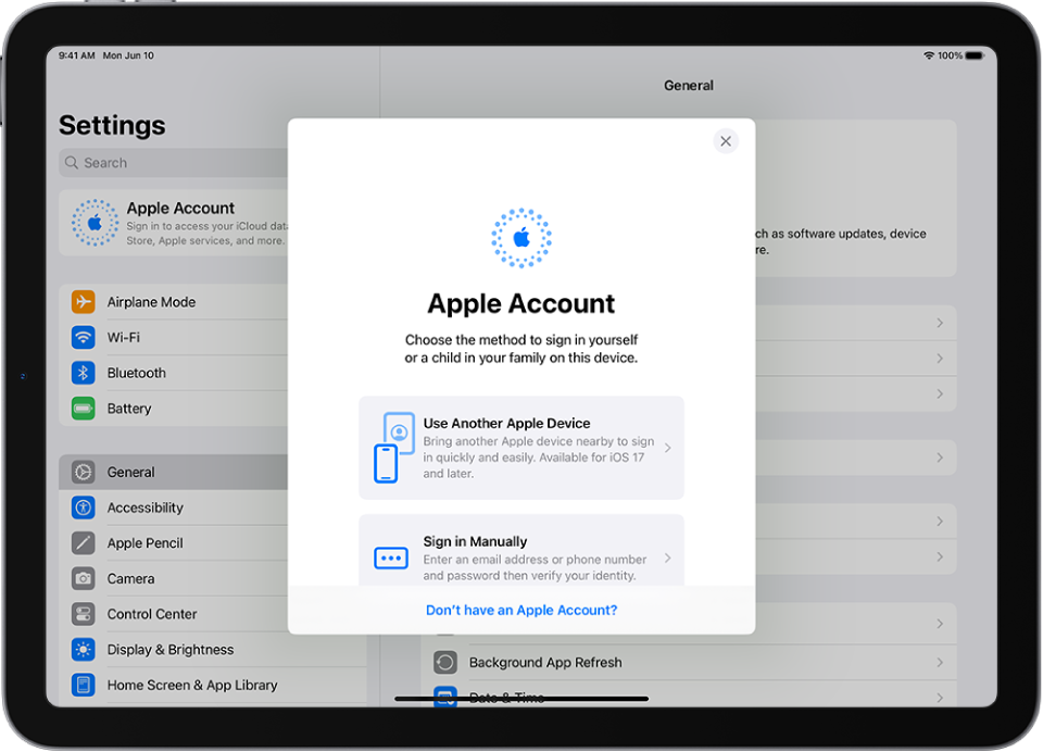 Skrin Seting, dengan dialog daftar masuk Akaun Apple di bahagian tengah skrin.