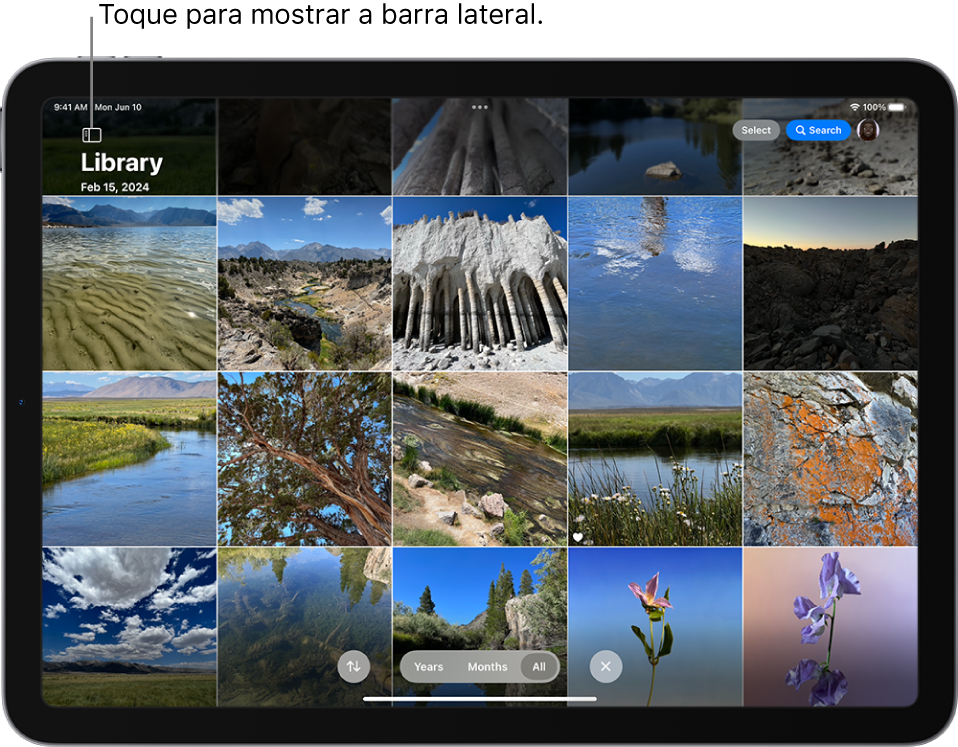 O app Fotos está aberto na fototeca. No canto superior esquerdo há um botão para mostrar a barra lateral. Na parte inferior ao centro há opções para ordenar a fototeca, incluindo os botões Filtrar, Anos, Meses, Tudo e um botão Fechar para sair da fototeca. Na canto parte superior direito da tela estão os botões Selecionar, Buscar e Perfil.