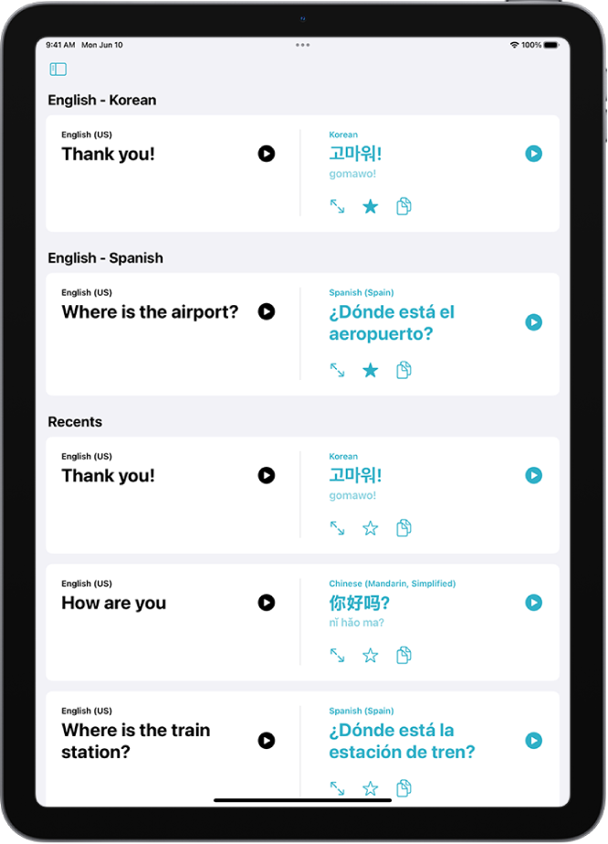 O separador “Favoritos” com frases guardadas traduzidas de inglês para coreano e de inglês para espanhol. Sob “Recentes” estão as frases traduzidas recentemente.