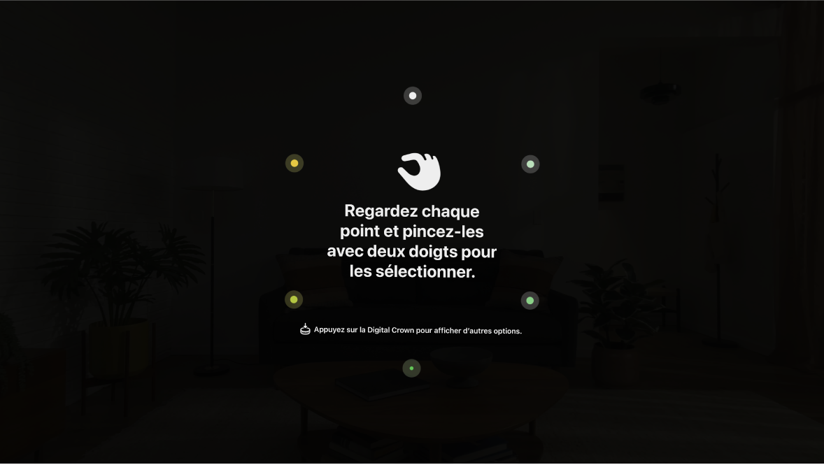 Configuration du regard sur l’Apple Vision Pro, qui demande à l’utilisateur de regarder chaque point et de joindre ses doigts pour le sélectionner.