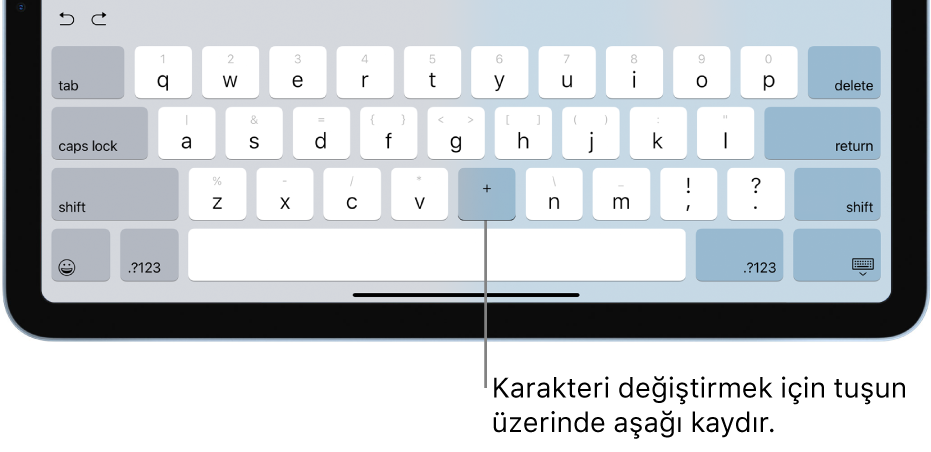 Kullanıcı B tuşunu aşağı kaydırdıktan sonra bu tuşun bir artı işaretine değiştirildiğini gösteren klavye.