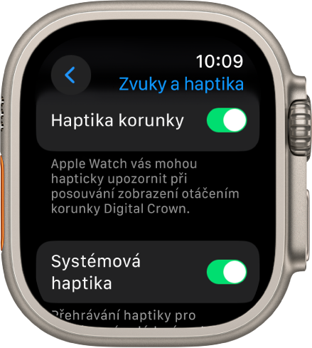 Obrazovka Haptika korunky se zapnutým přepínačem Haptika korunky. Dole je vidět přepínač Systémová haptika.