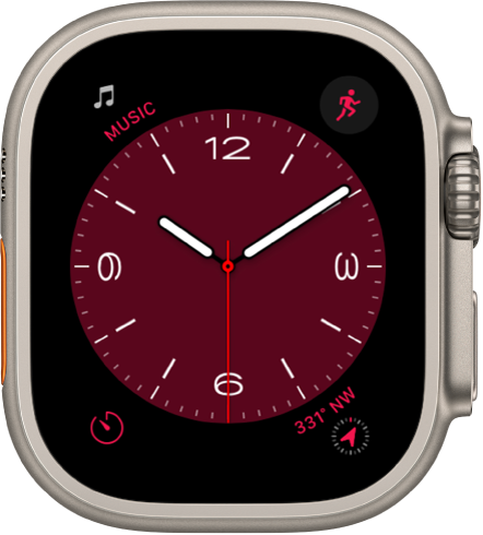 The Metropolitan watch face, where you can turn the Digital Crown to change the look of the type. It shows four complications—Music at the top left, Workout at the top right, Timer at the bottom left, and Compass at the bottom right.