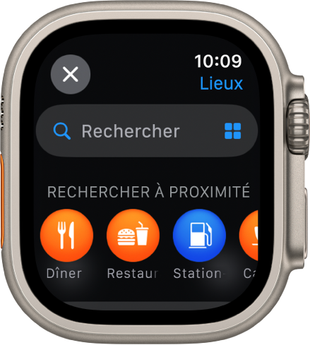 L’écran Rechercher dans l’app Plans, avec le champ Rechercher dans le haut. Un en-tête Rechercher à proximité se trouve dans le bas avec des catégories comme Dîner et Stations-services en dessous.
