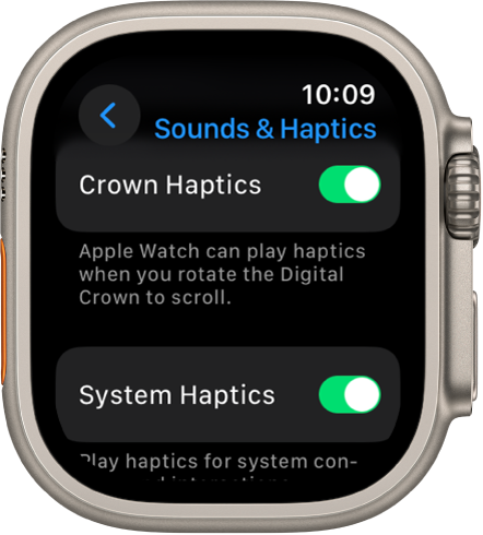 Ekrāns Crown Haptics, kurā redzams ieslēgts slēdzis Crown Haptics. Apakšā ir slēdzis System Haptics.