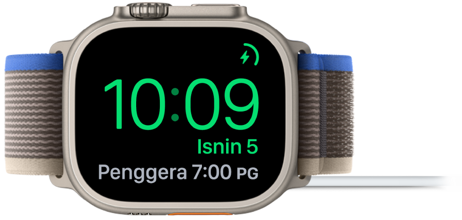 Apple Watch diletakkan di sisi dan bersambung ke pengecas, dengan skrin menunjukkan simbol mengecas di penjuru atas kanan, masa semasa di bawahnya dan penggera di sebelahnya.