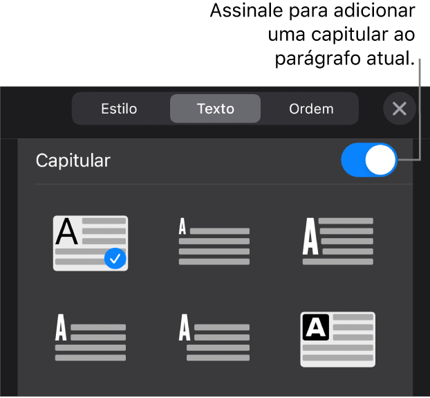 Os controlos de “Capitular” no menu “Texto”.