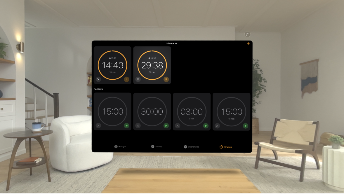 L’app Horloge sur l’Apple Vision Pro, affichant plusieurs minuteurs actifs.