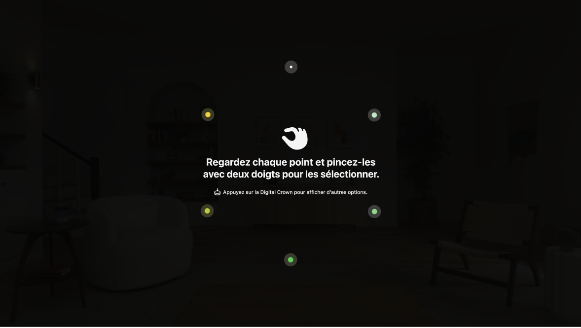 Configuration du regard sur l’Apple Vision Pro, demandant à l’utilisateur de regarder chaque point et de les pincer avec deux doigts pour les sélectionner.