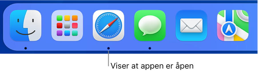 En del av Dock med svarte prikker under åpne apper.