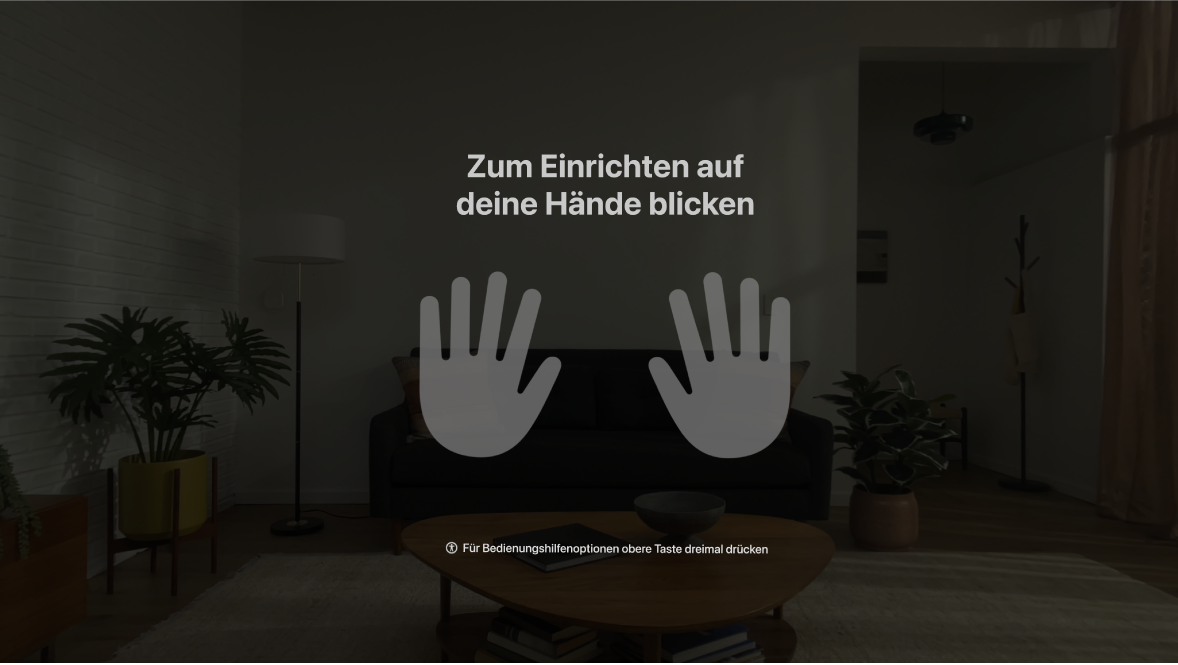 Einrichtung der Hände auf der Apple Vision Pro. Benutzer:innen werden aufgefordert, ihre Hände anzusehen, die vor ihnen angezeigt werden.