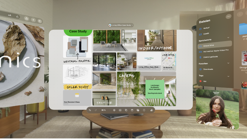 Auf der Apple Vision Pro sind mehrere Apps geöffnet und vor der nutzenden Person bzw. um sie herum angeordnet.