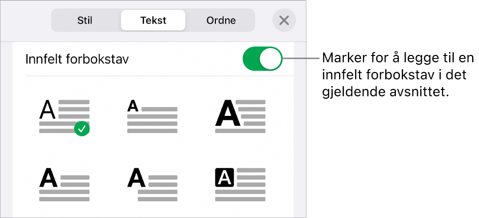 Innfelt forbokstav-kontrollene vises i Tekst-menyen.