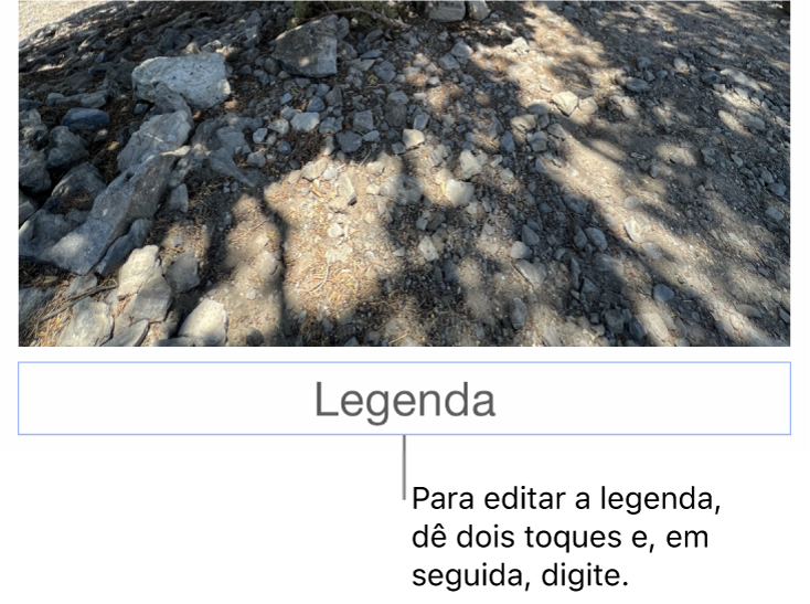 O marcador de posição de legenda, “Legenda”, aparece sob a fotografia; um contorno azul em redor do campo de legenda para mostrar que está selecionado.