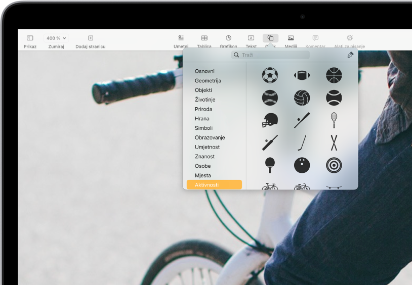 Alatna traka sa tipkama za dodavanje tablica, grafikona, tekstualnih okvira, oblika i medija. Odabran je Oblik i prikazuje odabranu kategoriju Aktivnosti u rubnom stupcu s lijeve strane i oblike s desne.