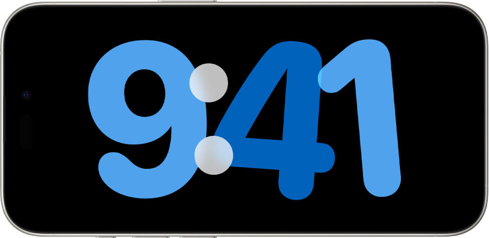 Un iPhone en modo “En reposo”, cargando y en horizontal, muestra un reloj digital en la pantalla.