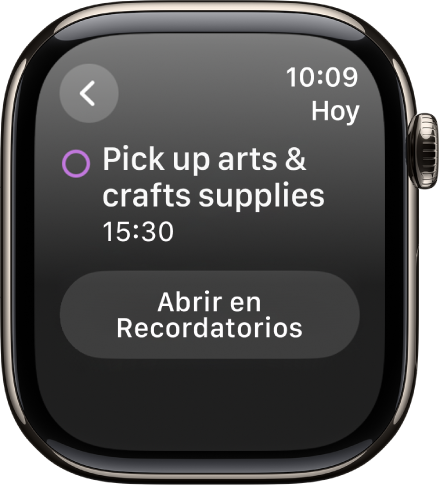 Pantalla de Calendario con un recordatorio. El nombre del recordatorio se muestra arriba con la hora del recordatorio debajo. La fecha del evento se muestra arriba a la derecha. En la parte inferior de la pantalla de la app Recordatorios, se muestra un botón para abrir el recordatorio.