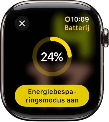 Het scherm van de energiebesparingsmodus, met een gedeeltelijk gele ring waarmee de resterende batterijlading wordt aangegeven. Onderin staat de knop 'Energiebesparingsmodus aan'.